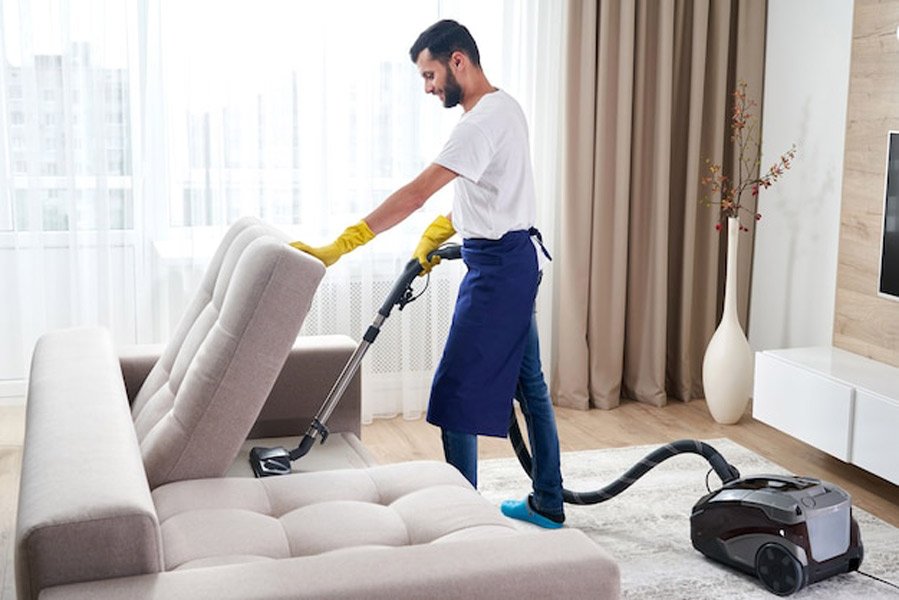 Professional cleaners at S/B Cleaning Expertise performing detailed office cleaning as part of their high-quality commercial cleaning services.